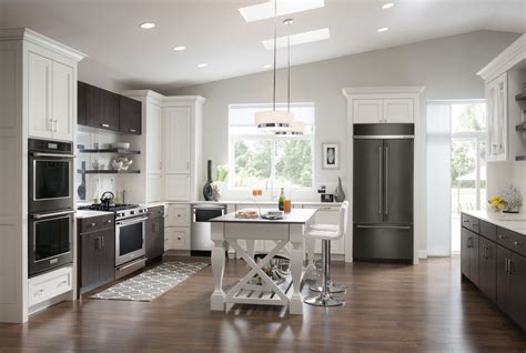 cream cabinets with black stainless steel appliances|black stainless steel black cabinets.